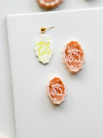 Zizi Lemon Frame Cutter: Scalloped Oval Citrus Shape for Polymer Clay