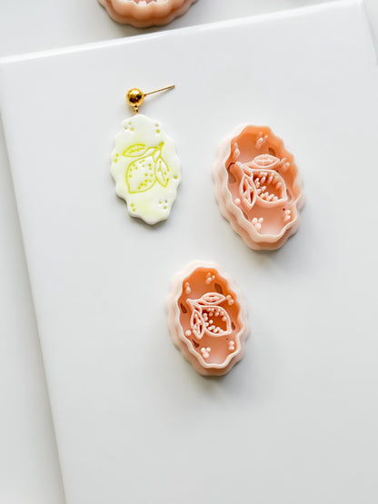 Zizi Lemon Frame Cutter: Scalloped Oval Citrus Shape for Polymer Clay