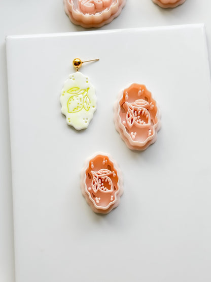 Zizi Lemon Frame Cutter: Scalloped Oval Citrus Shape for Polymer Clay