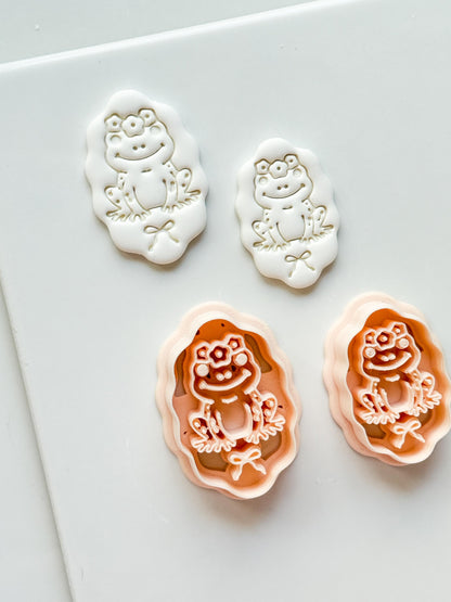 Tavi Floral Frog Clay Cutter: Scalloped Oval Frame for Polymer Clay