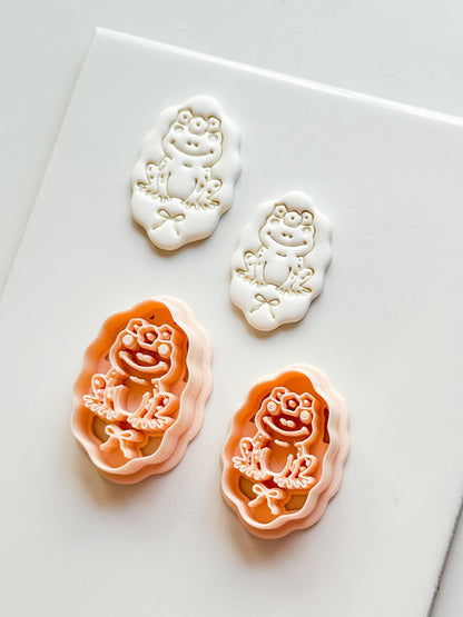 Tavi Floral Frog Clay Cutter: Scalloped Oval Frame for Polymer Clay